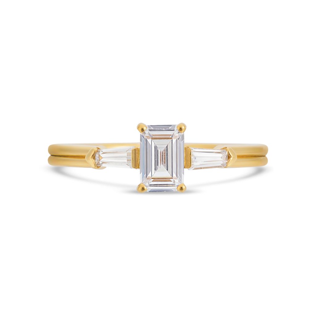 Illusion bullet emerald cut diamond ring in yellow gold