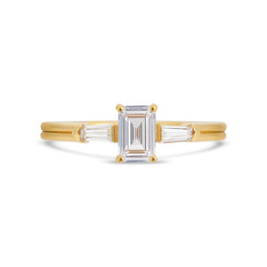 Illusion bullet & emerald cut diamond ring in yellow gold