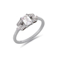Emerald cut buckle diamond ring in white gold