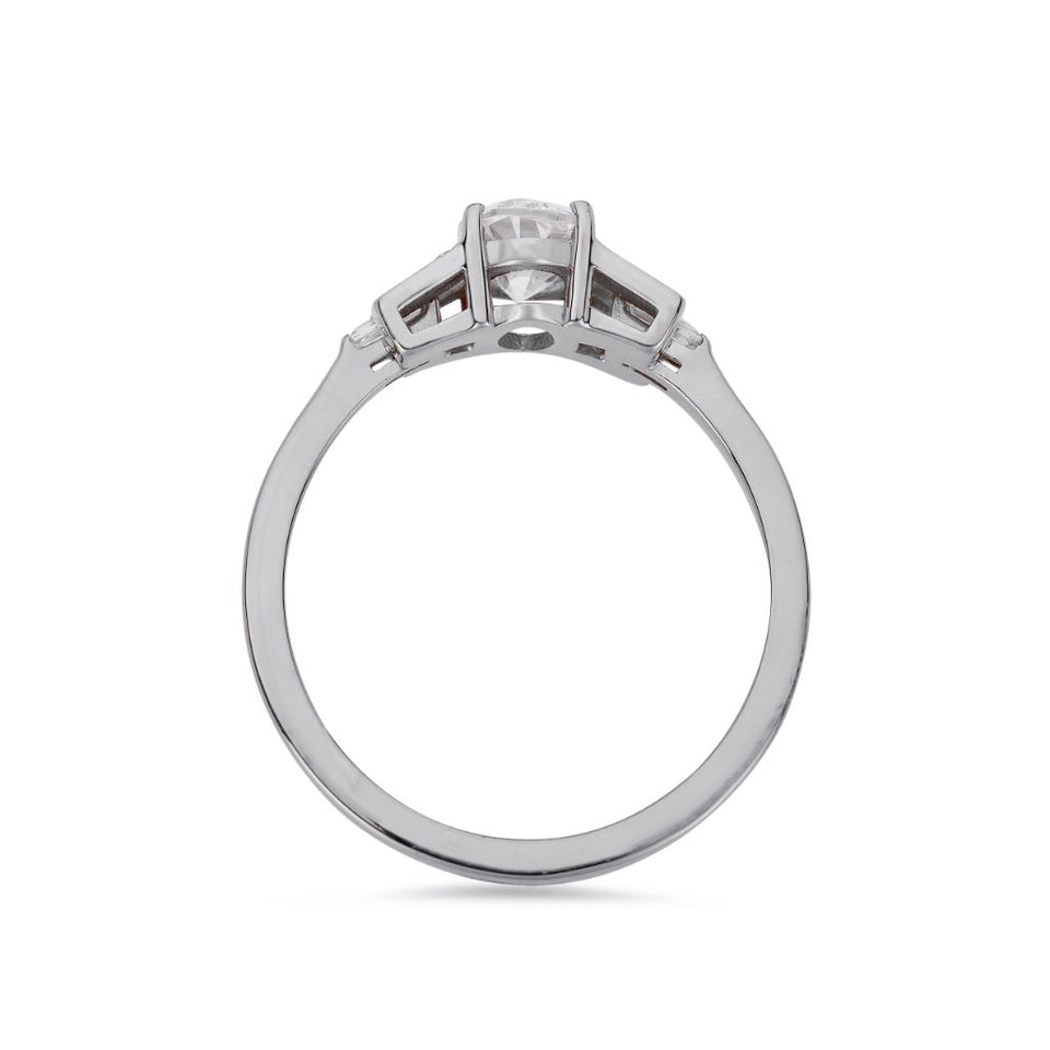 Oval cut diamond buckle ring in white gold
