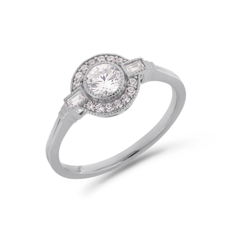 Round Art Deco diamond halo ring in platinum