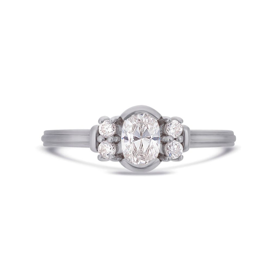 Deco oval cut solitaire diamond ring in white gold