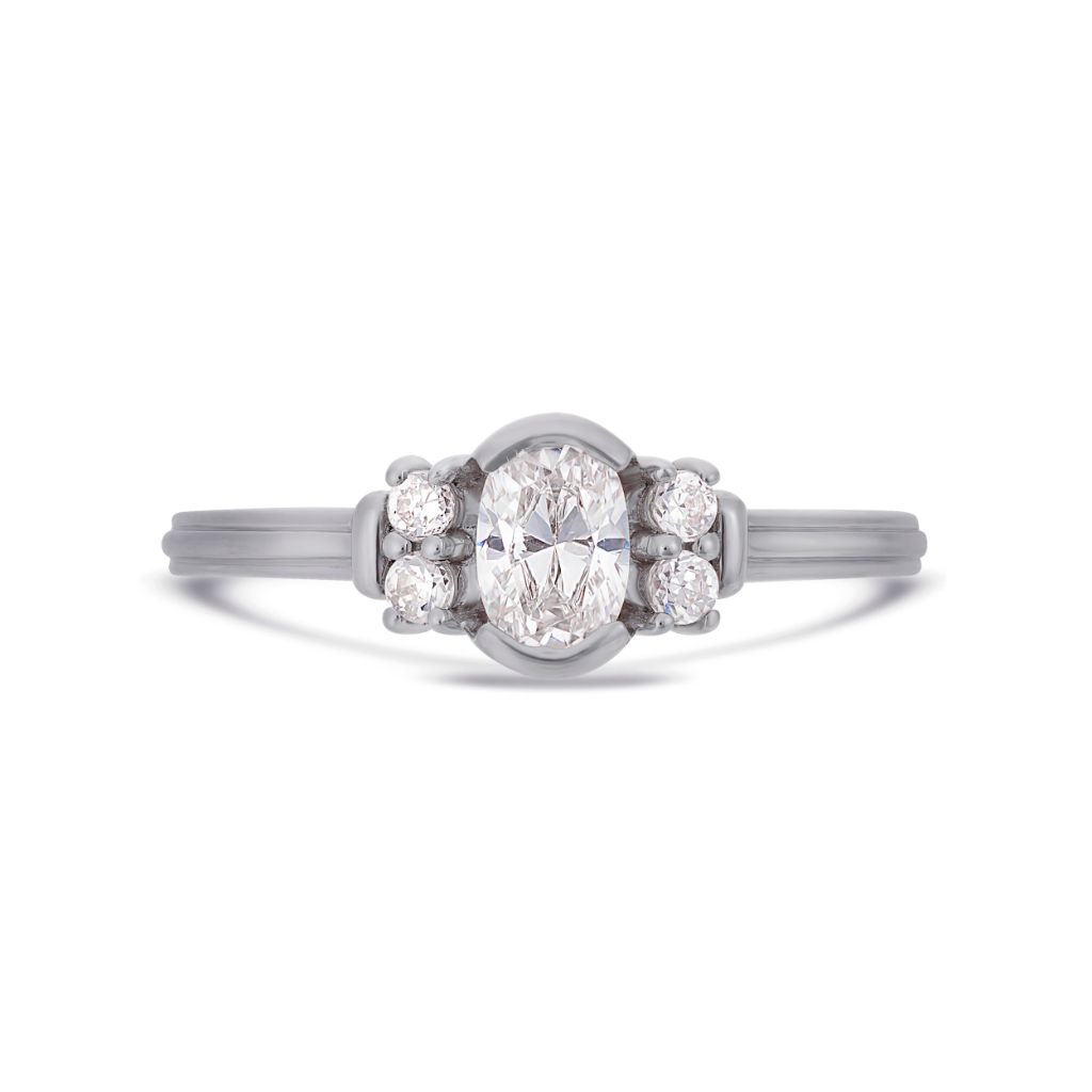 Deco oval cut solitaire diamond ring in platinum