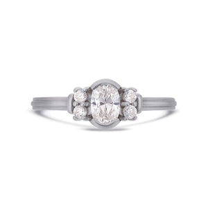 Deco oval cut solitaire diamond ring in platinum