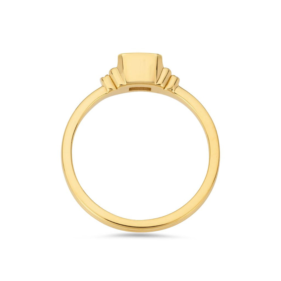 Deco emerald cut solitaire diamond ring in yellow gold