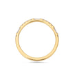 Round & baguette cut diamond ring in yellow gold