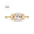 Oval cut diamond buckle ring in yellow gold